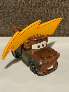 Disney Pixar World of Cars Tow Mater With Lightning Bolt Truck Die Cast Brown